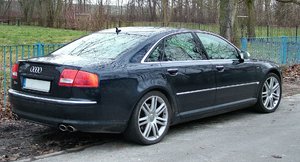 Audi_S8_V10_black_with_blue_fence.jpg