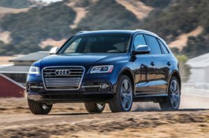 2014 audi sq5 three quarters in motion drivers view 001